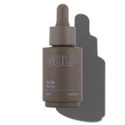 Gulp Glow facial oil bottle with dropper on a transparent background